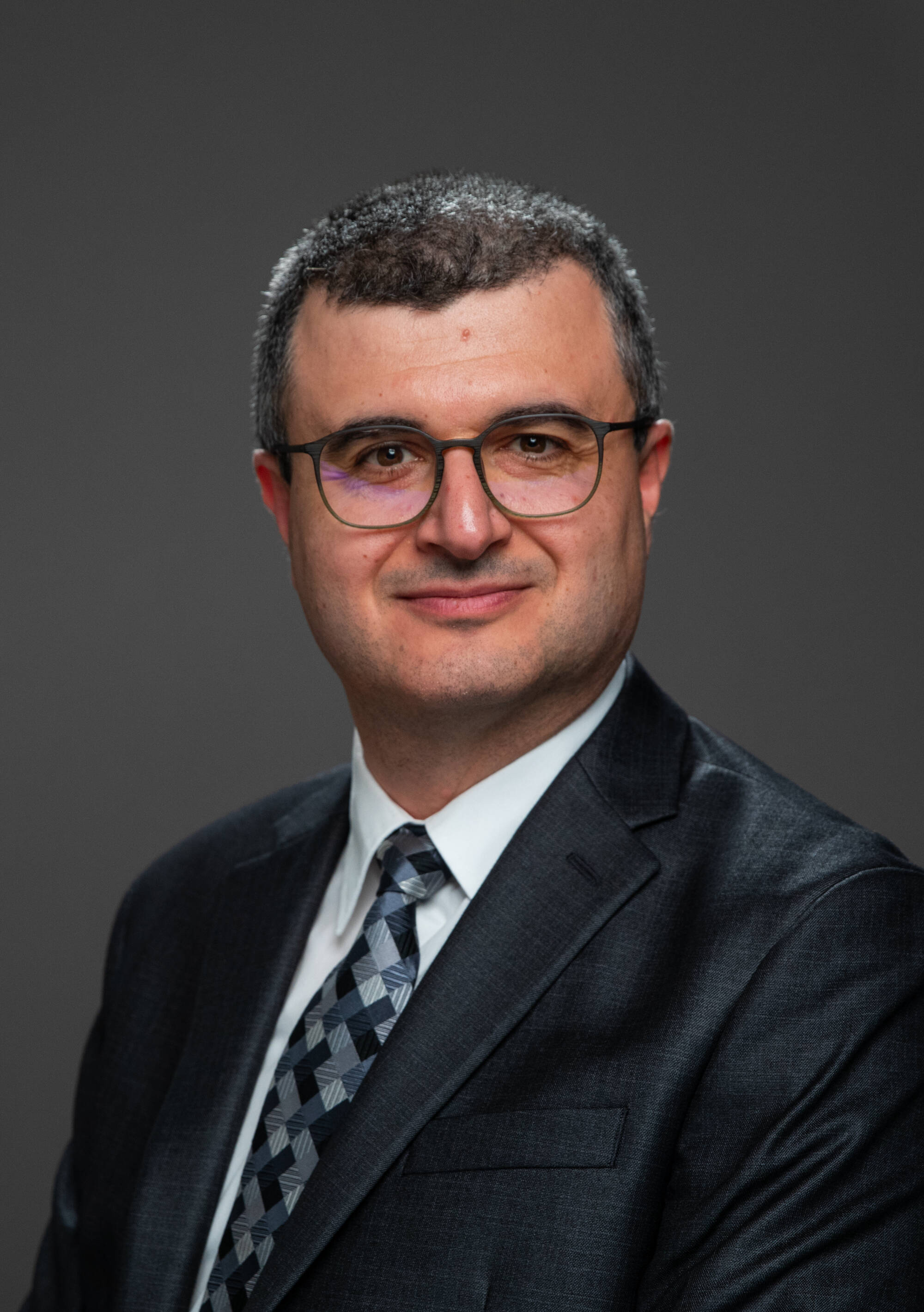 Dr Ali Olcay